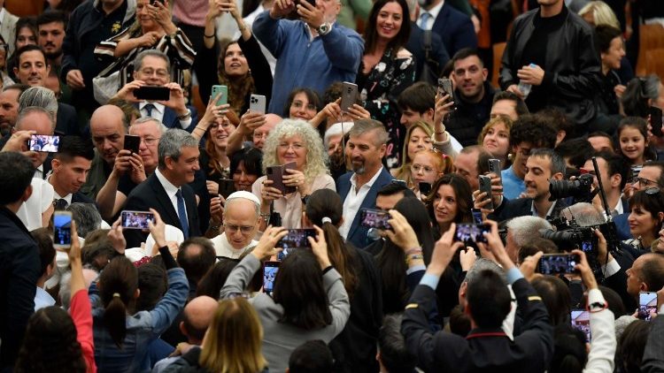 Pope Leo XIV in the midst of Vatican employees