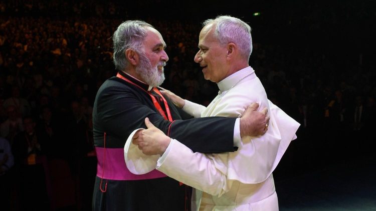 Pope Leo hugs one of the participants of the International Meeting "Happy Priests - I have called you friends"