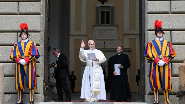 Pope Leo XIV prays the Angelus in front of the papal residence in Castel Gandolfo