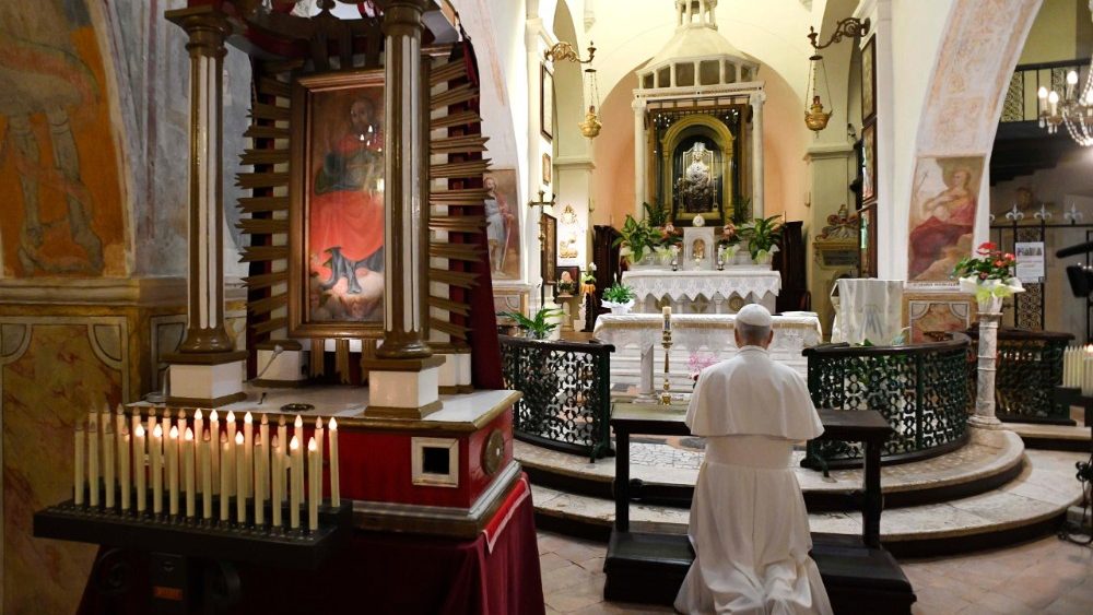 Pope Leo praying at the Shrine