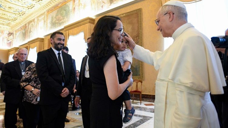 Pope Leo XIV greeting participants in the meeting