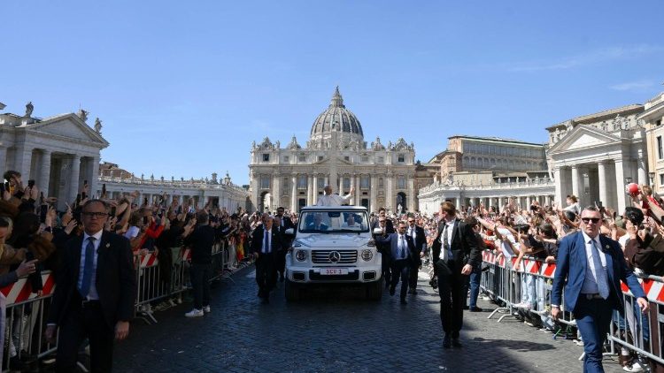 Pope Leo greets the crowds gathered for the Urbi et Orbi address