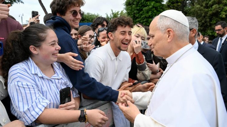 Pope Leo greeting students
