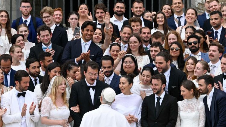 Pope Leo XIV greets newlyweds during the General Audience
