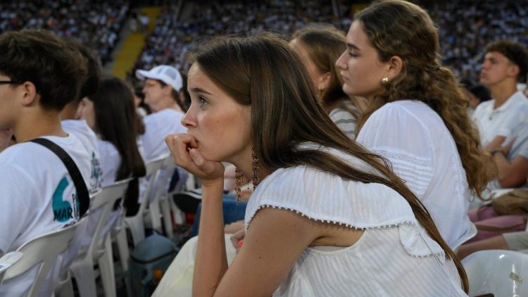 Young people listening to Pope Leo's words at the Llu&iacute;s Companys Olympic Stadium in Barcelona