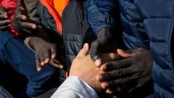 Encontro com os migrantes do Centro Las Raíces