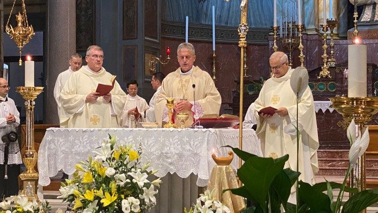 Image from Mass with the Parish's Pastor, Father Piotr Sulkowski (left); Archbishop Vittorio Francesco Viola (center); and Father Antonio Cirulli (right)