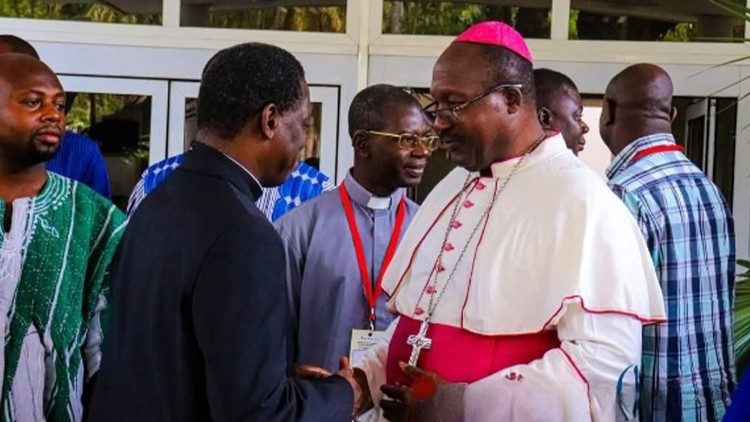 Apostolic Nuncio to Ghana, Archbishop Julien Kabore (in black suit) with Bishop Kumordji SVD (in white robes)