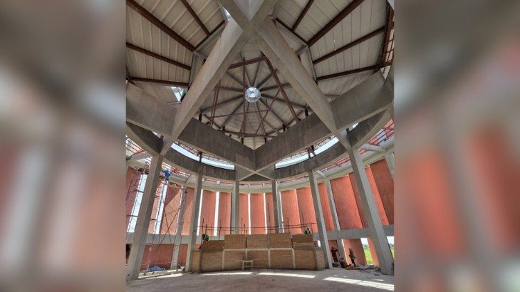 A view inside the under-construction Divine Mercy Chapel, showcasing its circular design and high ceilings that optimize natural light and airflow. Photo: