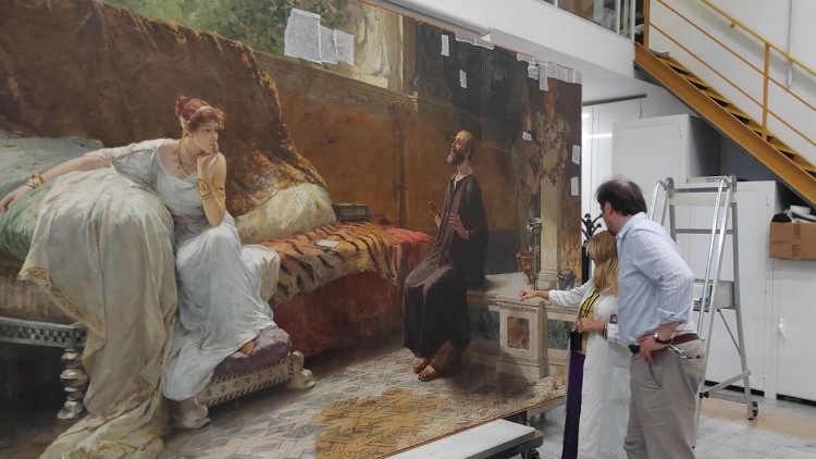 Paolo Violini con los restauradores del Laboratorio de los Museos Vaticanos