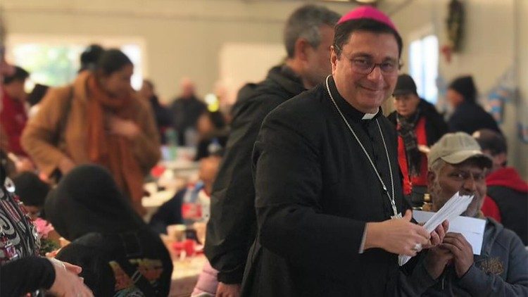 The Bishop of Albano, Monsignor Vincenzo Viva, during a lunch with the poor.