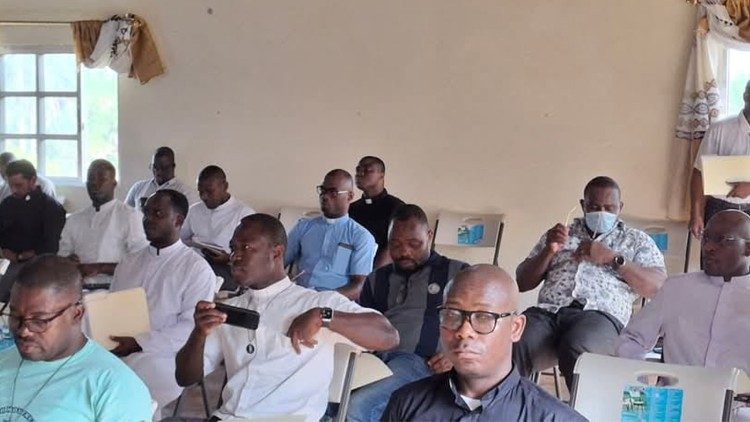 Some othe priests at the conference