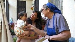 Sister Magdalena Smet with residents of Dbayeh camp