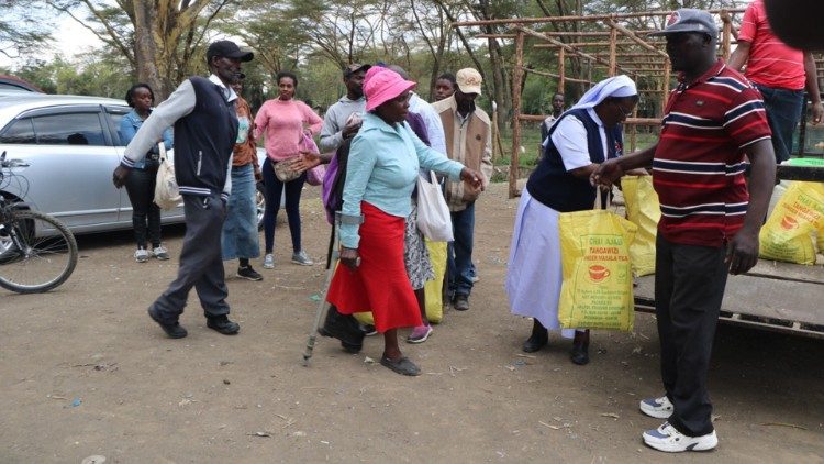 Sr.  Mumbua supports Lake Naivasha Disabled and Deaf fishermen groups with food donations