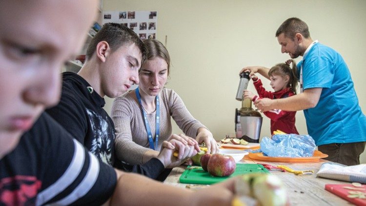 Kateryna Kremin volunteers with children with special needs at Caritas Ternopil. (photo: Konstantin Chernichkin)