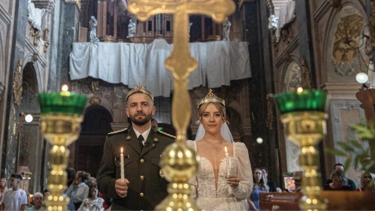 Volodymyr and Solomiya Svyst were married at Sts. Peter and Paul Garrison Church in Lviv, 21 September. Volodymyr had returned from the front for their wedding. Photo: