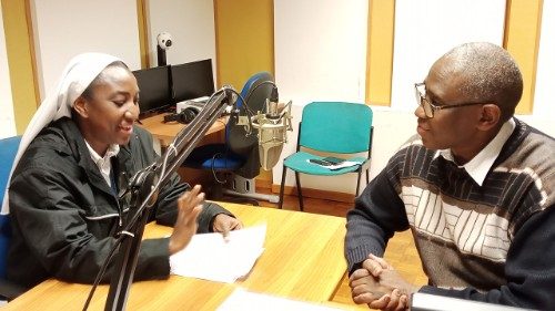 Sr Oluwakemi Akinleye fsp, and Mr John Baptist Tumusiime in a training session at the Vatican News - Vatican Radio studios.