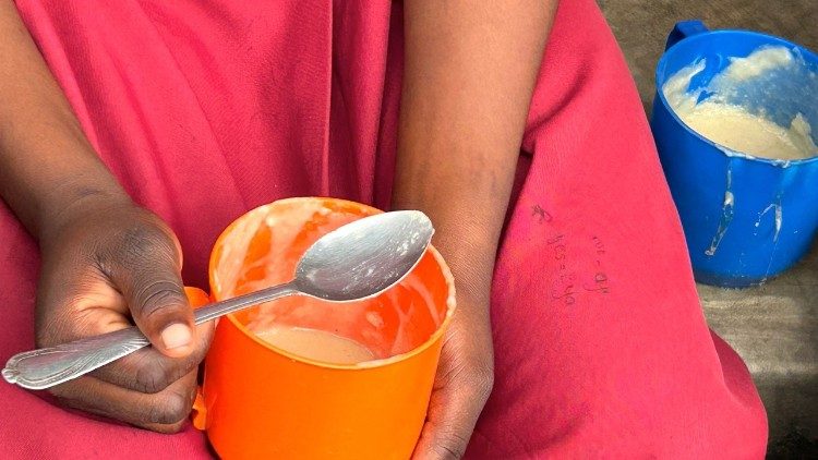 Mary's Meals provides a meal to children at school