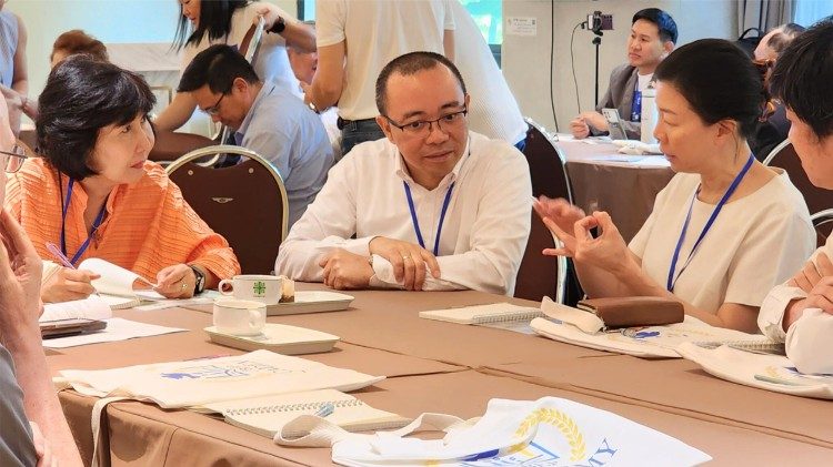 Program participants engage in small group discussions reflecting on how their business practices can better reflect the face of Christ. Photo by Peter Monthienvichienchai