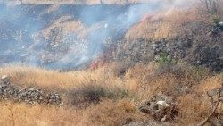 A fire burns near Taybeh in the West Bank