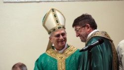 Fr. Alejandro Moral with then Cardinal Robert Prevost