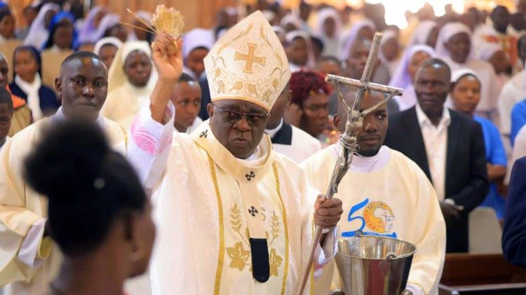 (File) Archbishop Paul Ssemogerere surrounded by the faithful 