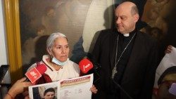 Bishop Francisco Javier Acero and one of the "searching mothers"