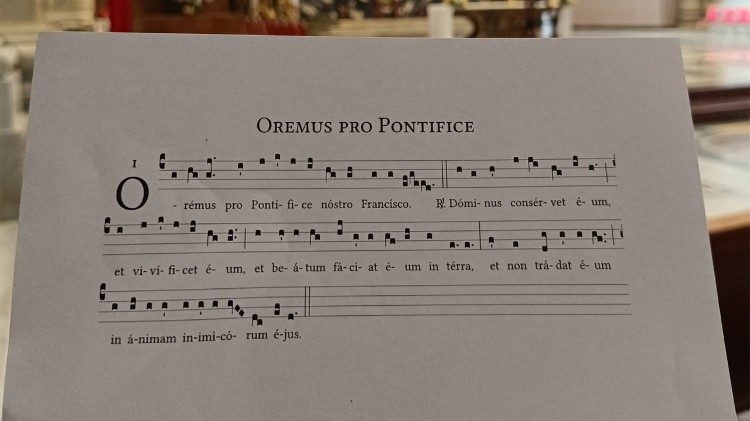 A letra originalmente em latim