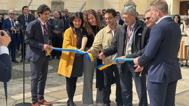 Paolo Ruffini, third from right, officially opens the exhibition