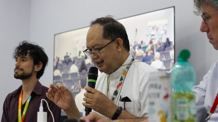 Cardinal David speaks at a Caritas event at COP30, Belém, Brazil
