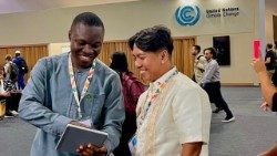 Antonio Korkuvi (left) with a colleague during COP30