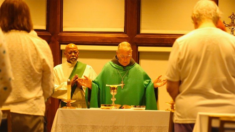 Archbishop Gregory Hartmayer of Atlanta opens the conference with Mass
