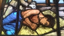 A stained glass window depicting the martyrdom of Peter To Rot in the Church in Rakunai village