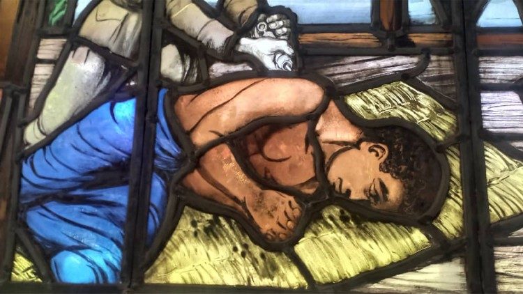 A stained glass window depicting the martyrdom of Peter To Rot in the Church in Rakunai village
