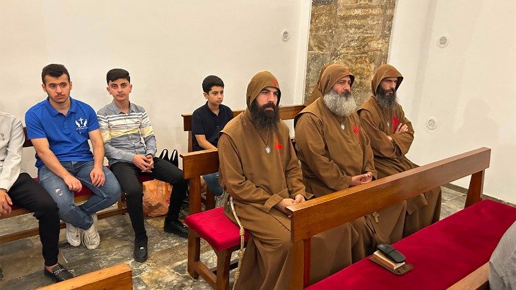Monks and lay faithful attend the reconsecration of Mosul’s historic Al-Tahira church