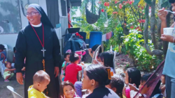 Sr. Ruby Eden at mealtime with the children