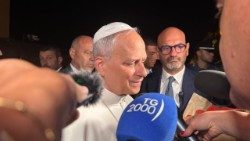 Pope Leo speaks to reporters as he leaves Castel Gandolfo on September 16, 2025