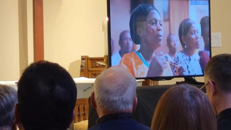 Young people pray the rosary