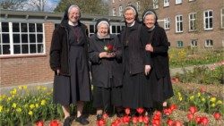 CPS Sisters standing in front of their large convent