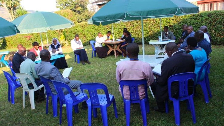 Paricipants engage in group discussions