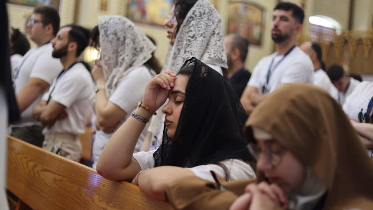 Cristiani iracheni in preghiera