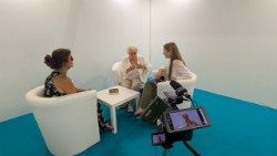 Nassera Kermiche (left) and Rosaline Hamel (centre) speak to Vatican News on the sidelines of the Rimini Meeting for Friendship Among Peoples