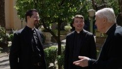 The Superior of Casa Santa Maria, Msgr. William Millea (R), speaking with resident American priests