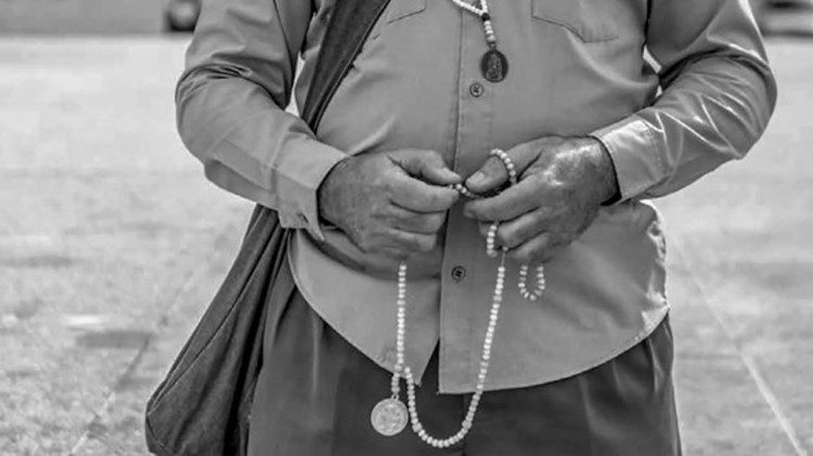 Homem rezando - João Rangel