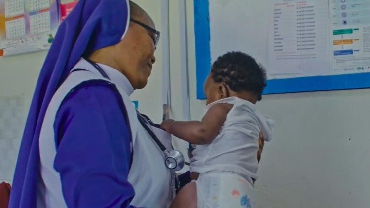 Sister attending to the babies in the clinic