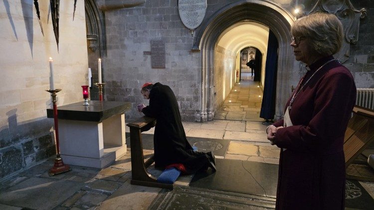 Cardinal Kock kneeling on the kneeler used by Pope John Paul II and Dame Sarah Mullally